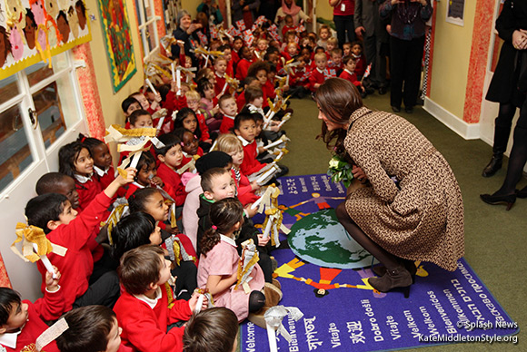 The Duchess of Cambridge speaks with school children during a visit to the Art Room facilities at Rose Hill Primary School in Oxford.