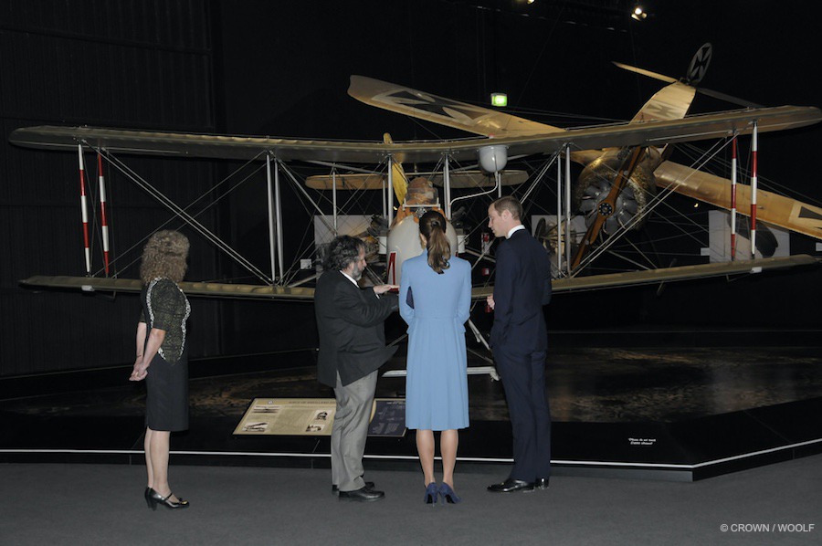 Kate looking at airplanes in New Zealand