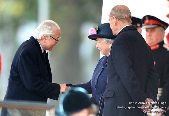 The Queen greeting President Tan