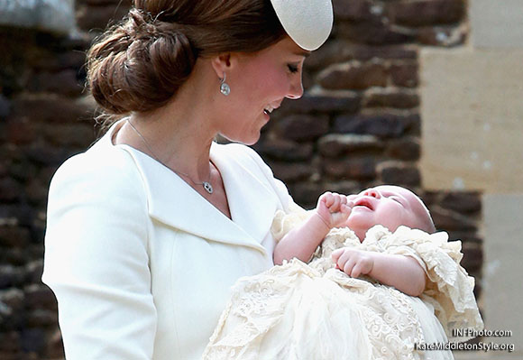 ***MANDATORY BYLINE TO READ INFPhoto.com ONLY***<BR /> Catherine, Duchess of Cambridge, Prince William, Duke of Cambridge, Princess Charlotte of Cambridge, Prince George of Cambridge, at the christening of Princess Charlotte of Cambridge at the church of St Mary Magdalene on the Sandringham Estate in King's Lynn, UK. <P> Pictured: Catherine, Duchess of Cambridge, Princess Charlotte of Cambridge <B>Ref: SPL1071653 050715 </B><BR /> Picture by: INFphoto.com<BR /> </P><P>