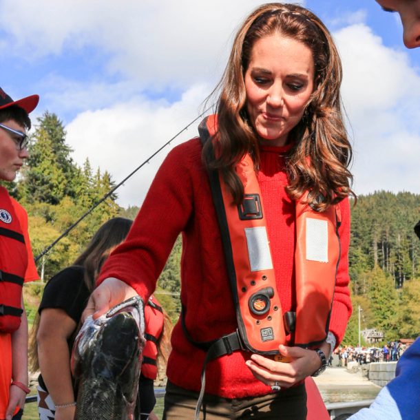 Kate Middleton wearing her red sweater in Haida Gwaii during a fishing trip