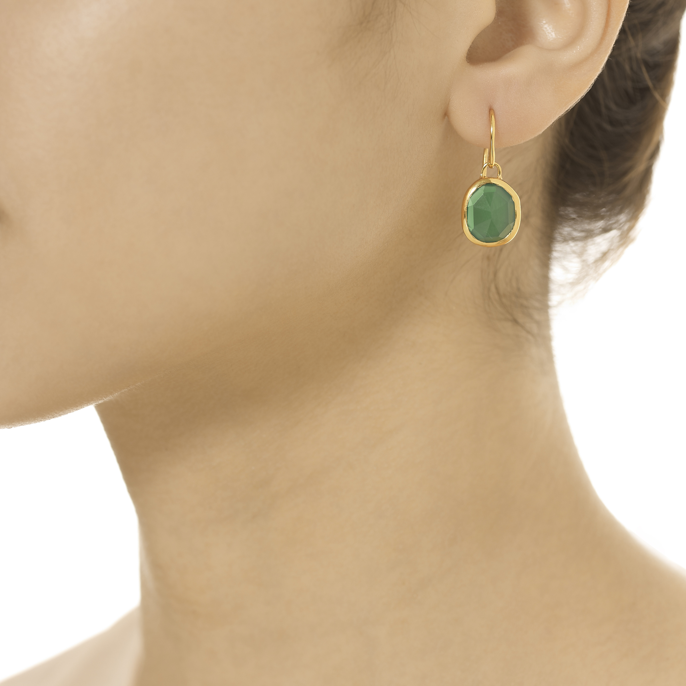 A model wearing the Monica Vinader Siren earrings