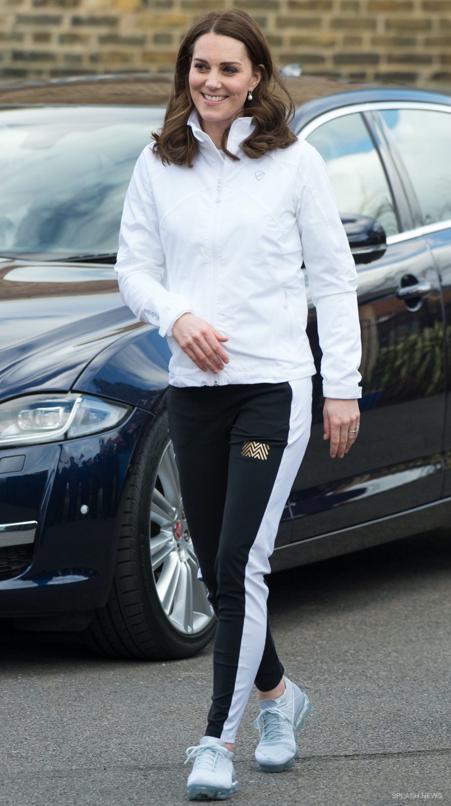 Casual Kate attends tennis engagement at primary school