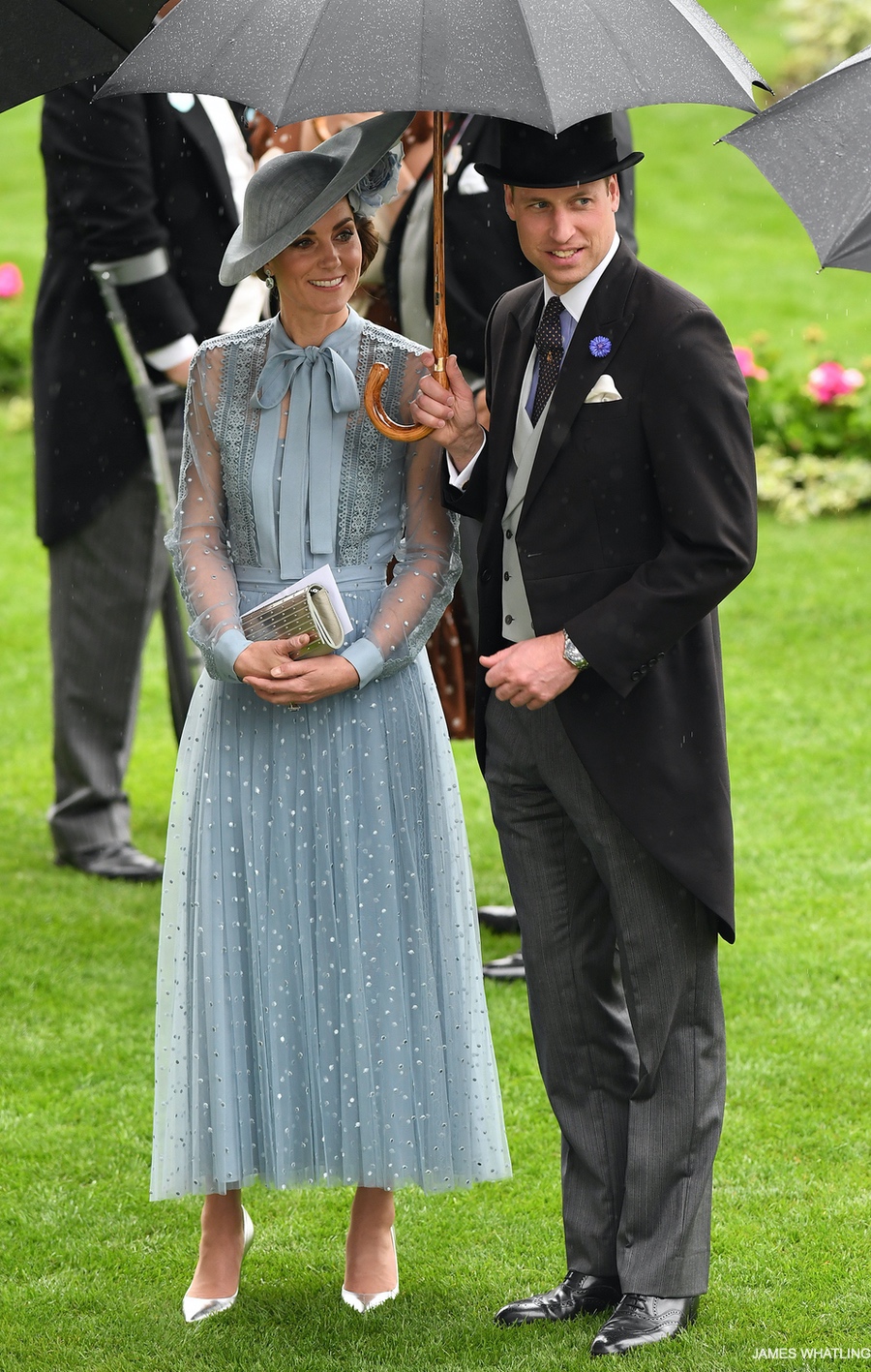 The Princess of Wales wears a pussybow blouse and skirt by Oscar de la Renta, which has been modified from the original design sent down the runway. It fits her to perfection.