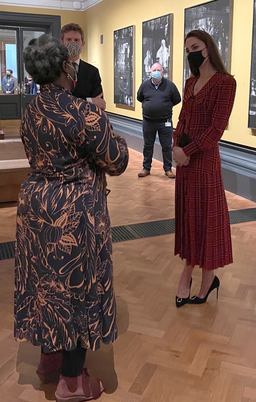 Kate in red houndstooth dress for Alice in Wonderland exhibition at the V&A Museum
