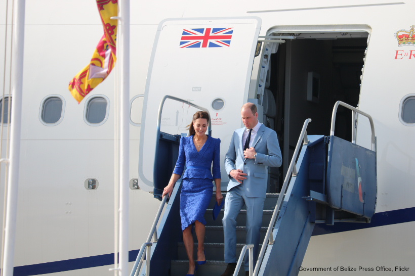William and Kate leaving the aeroplane in Belize. Kate is wearing an all blue outfit