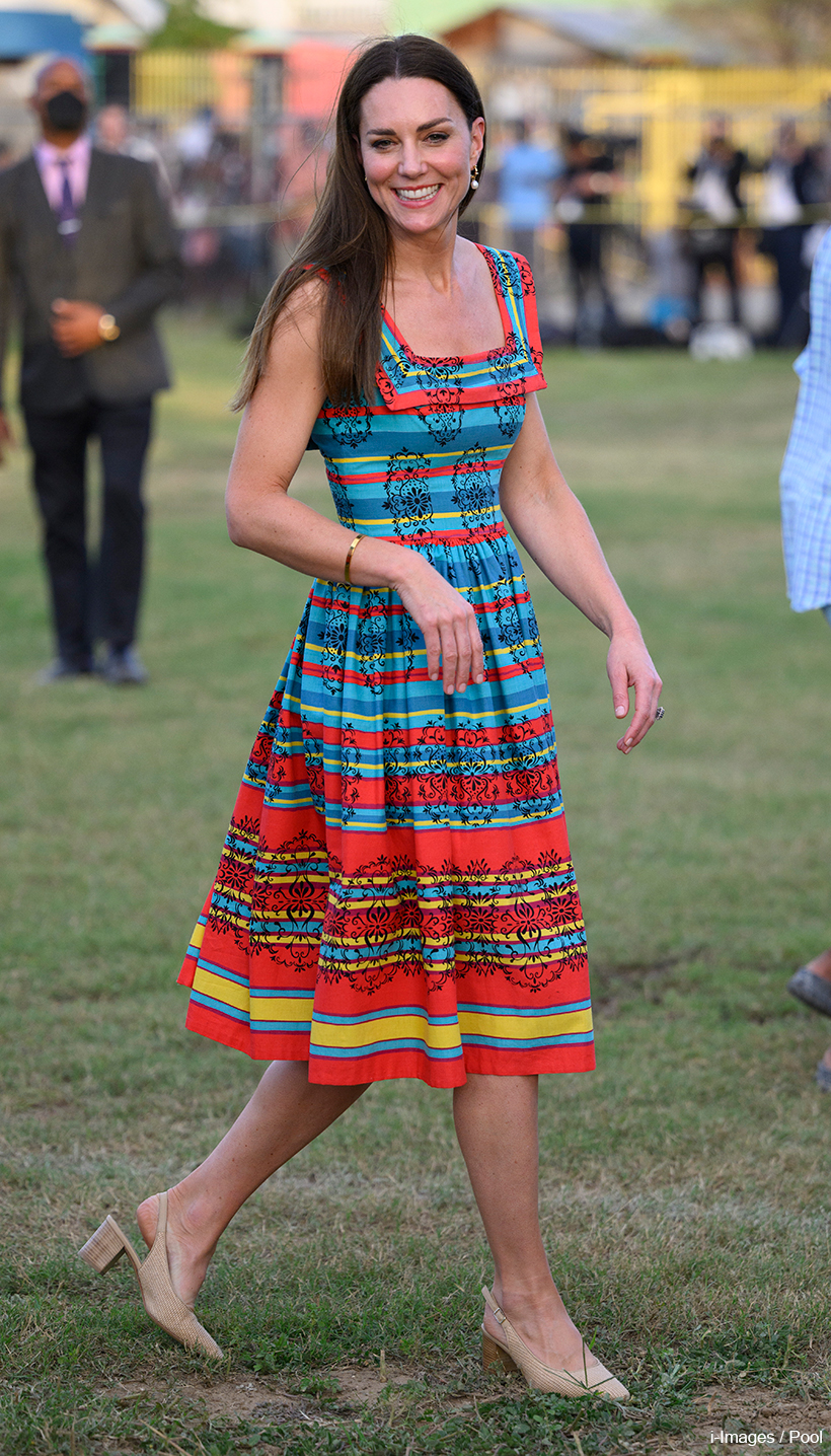 Kate wears colourful striped vintage sundress in Trench Town, Jamaica