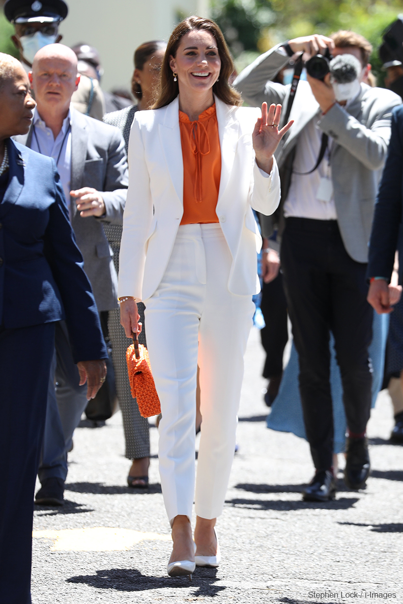 Kate Middleton wears white suit by Alexander McQueen with orange accessories on her second day in Jamaica