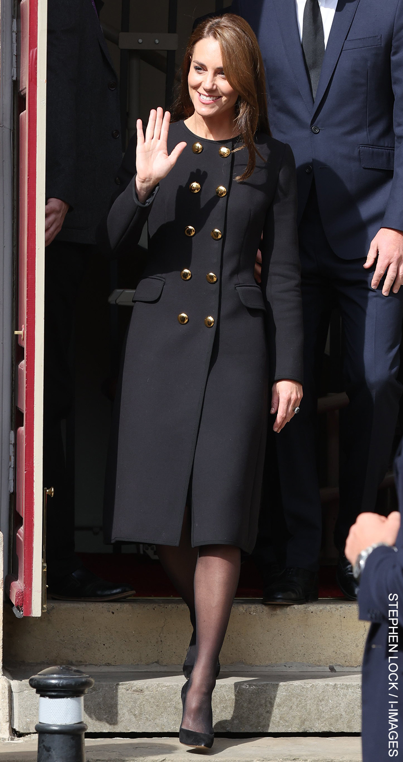 Kate Middleton repeats black Dolce & Gabbana coat to thank “unsung heroes” in Windsor