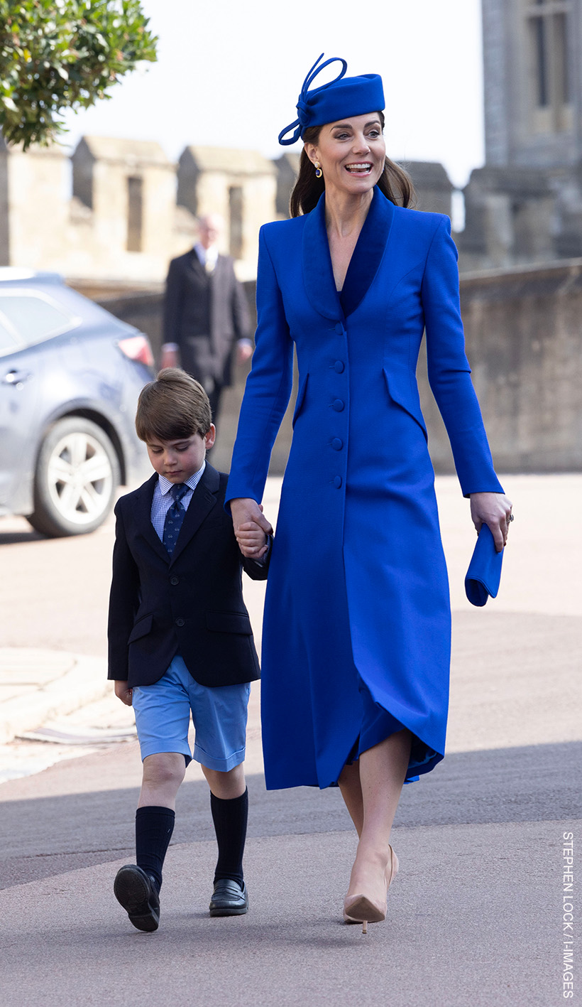 Kate Middleton walking to the chapel with her son Louis. The Princess wore a bold blue outfit for the 2023 Easter Sunday service.