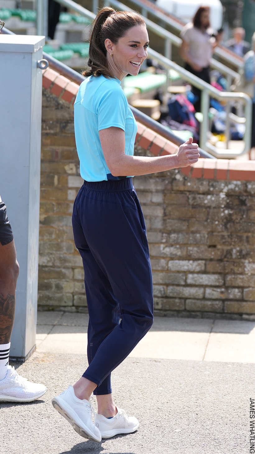 Kate Middleton wearing the Lululemon Chargefeel workout shoe in white at a different rugby event over the summer. She is also dressed in sportswear on this occasion.
