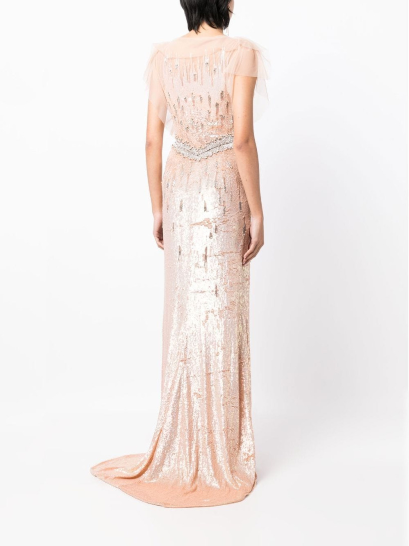 The gown from the back, shown on the model. The sequin design has a train.