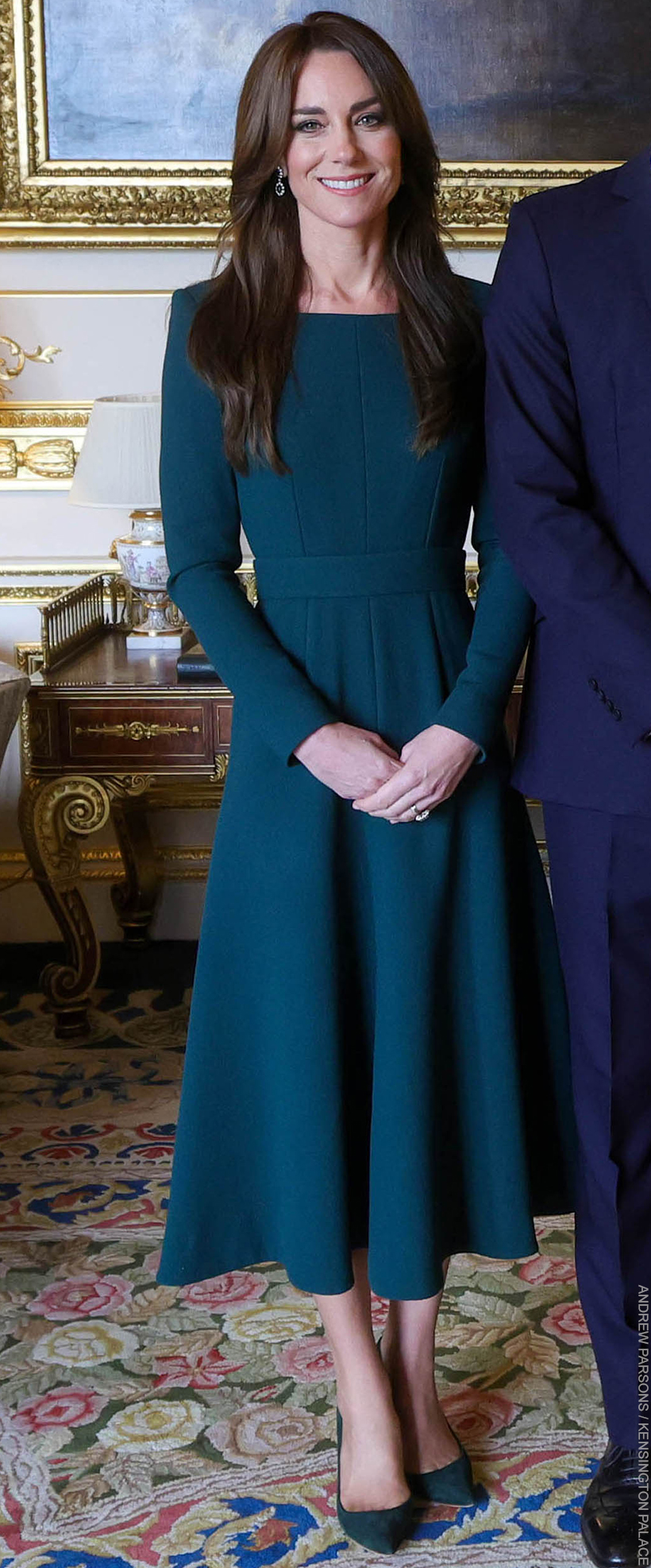 Kate Middleton wearing the same Emilia Wickstead dress in a petrol blue/teal colour to welcome Crown Princess Victoria of Sweden in November 2023