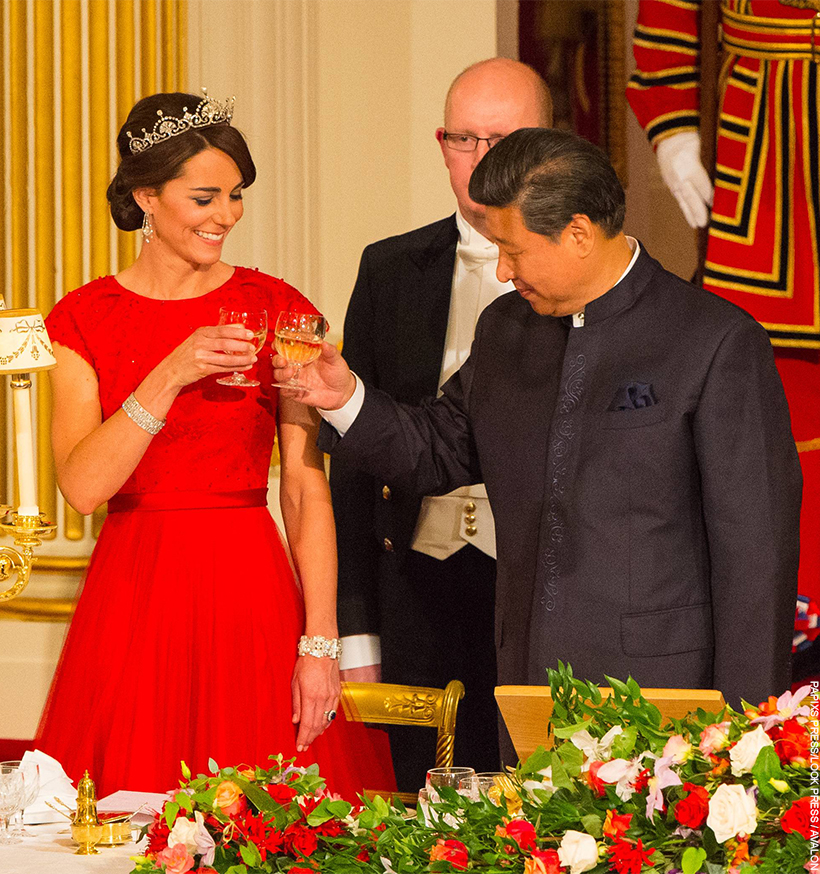 The then-Duchess of Cambridge toasts with the Chinese President. The Duchess wears the Lotus Flower Tiara and a red lace gown.