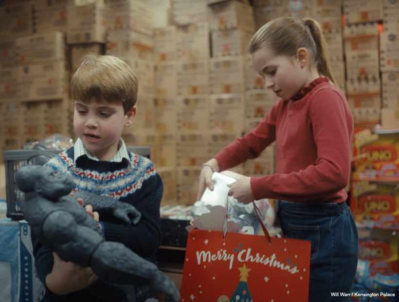 Charlotte and Louis look at toys