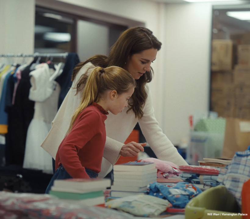 Kate and Charlotte sort through donations
