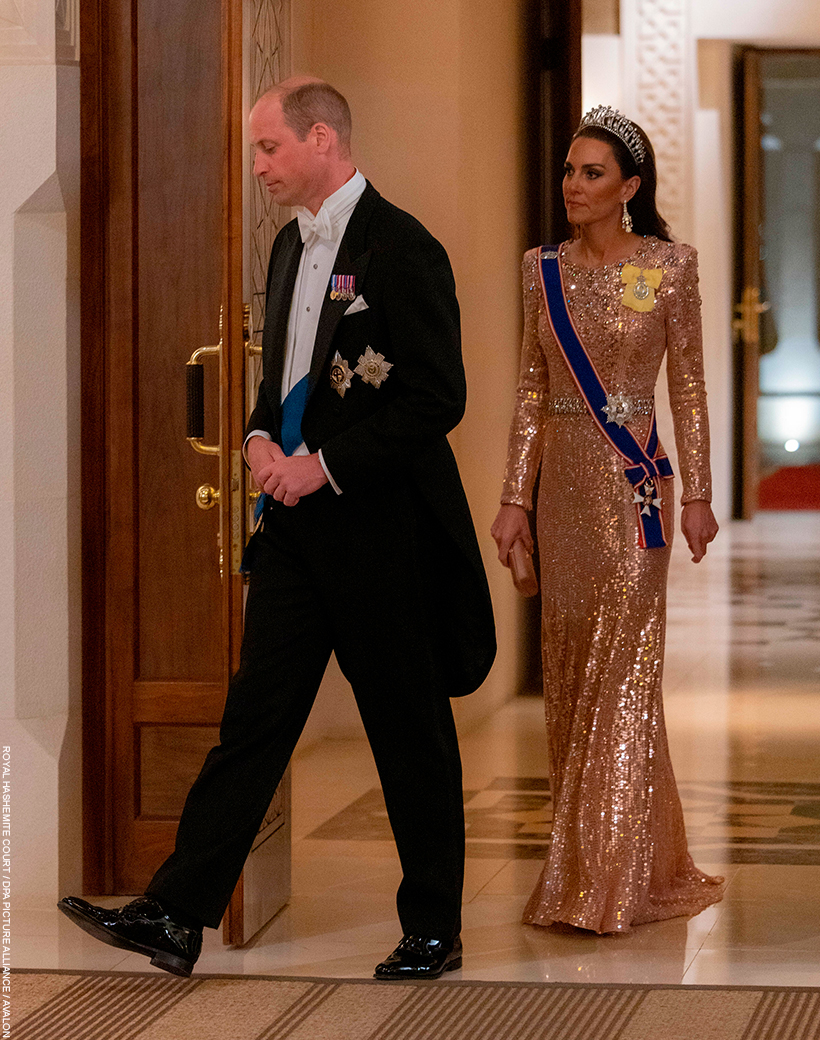 Prince William and Kate Middleton at the Jordan Royal Wedding. The Princess wears the 'Georgia' gown by Jenny Packham, a full-length dress adorned with rose gold sequins and crystal embellishments.