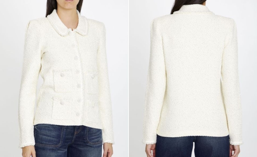 A model wearing the white Self-Portrait jacket and jeans.