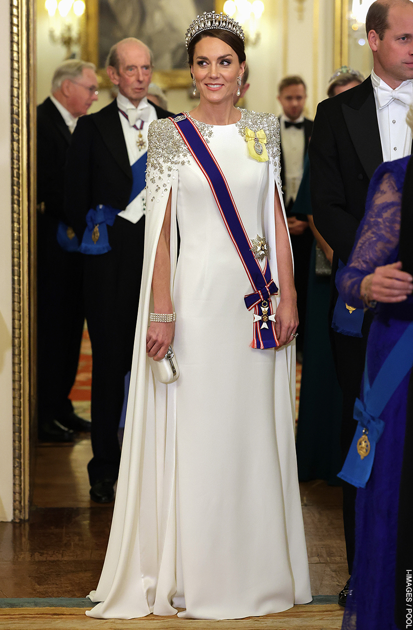Princess Kate looks spectacular in this white slip sleeve gown