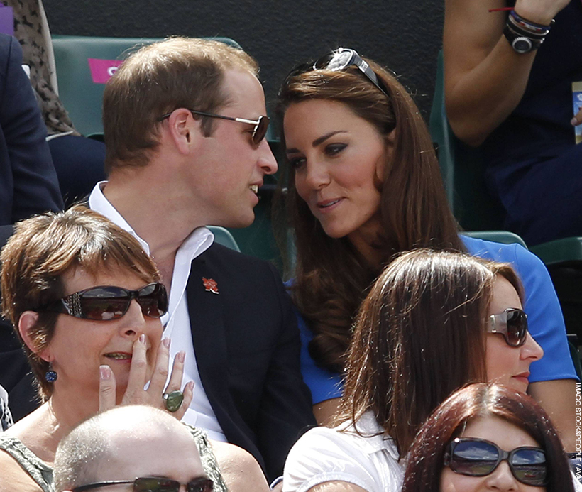Prince William and Kate Middleton share a whisper at Wimbledon. The
