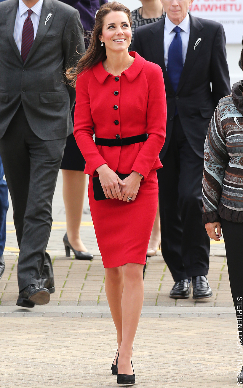 Kate Middleton wearing a striking red Luisa Spagnoli suit during her visit to Christchurch.
