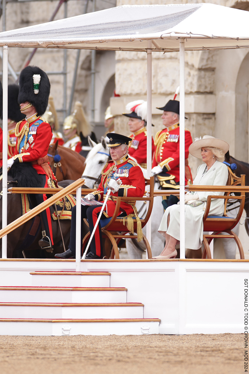 The King and Queen watch on