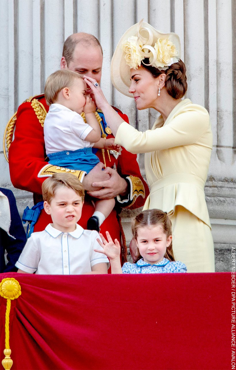 The Prince and Princess of Wales on the balcony of Buckingham Palace at a previous Trooping the Colour event, with their young family.