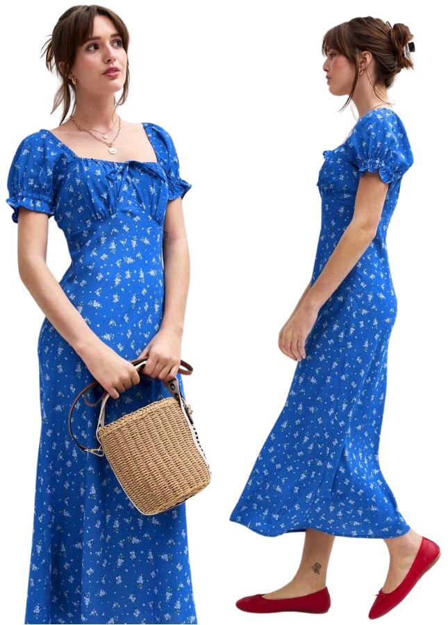 A model wears a blue floral print dress