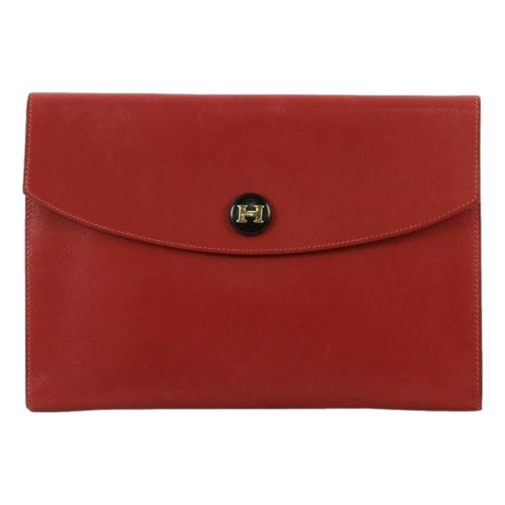 The Hermès ‘Rio’ Envelope Clutch in rich rouge leather