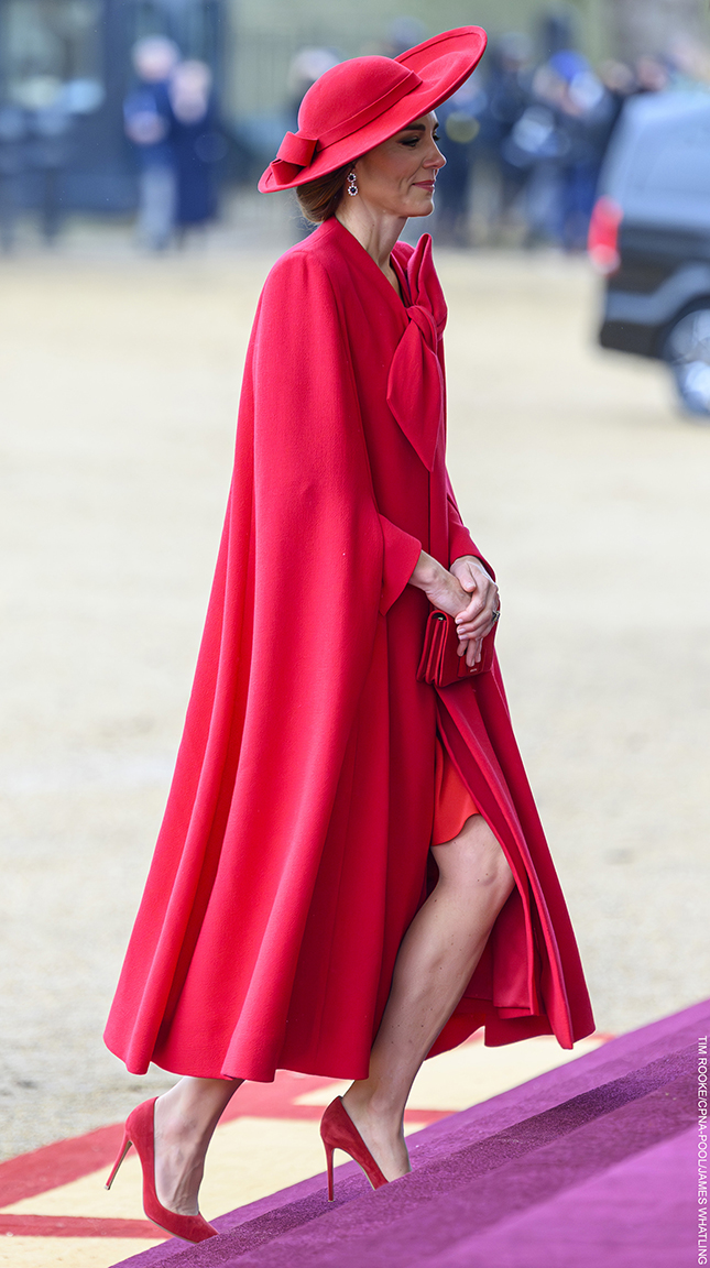 Side view of Kate Middleton in Catherine Walker, showing her leg as she walked up stairs