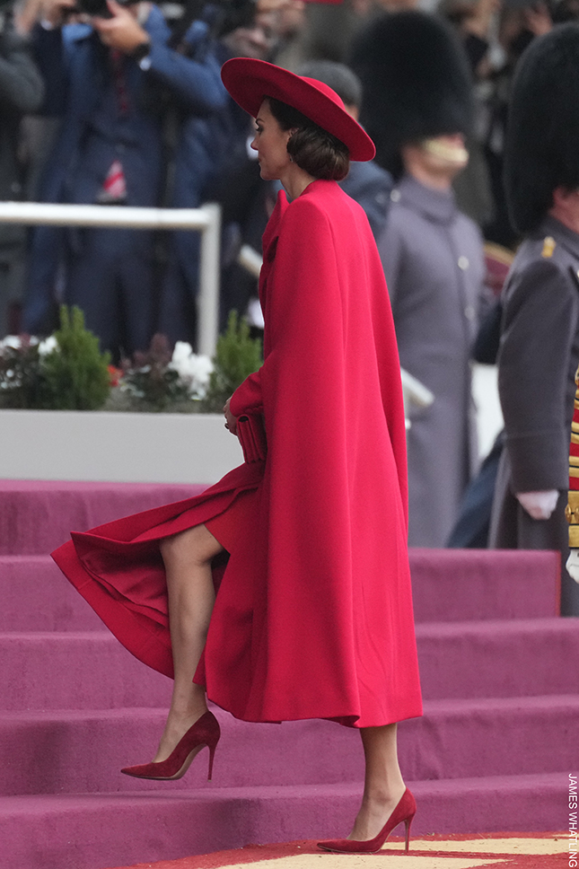 Side view of Kate Middleton in Catherine Walker, showing her leg as she walked up stairs