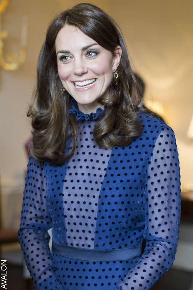 Detail of Kate Middleton's sheer polka-dot neckline and earrings at the Buckingham Palace reception.
