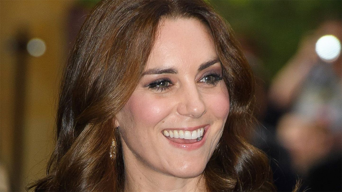 a close up of Kate Middleton's face, smiling