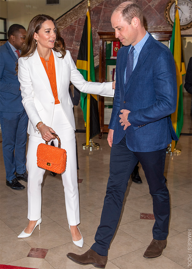 Kate Middleton carrying a vintage Dayne Taylor orange raffia beaded bag, sourced from Willow Hilson Vintage