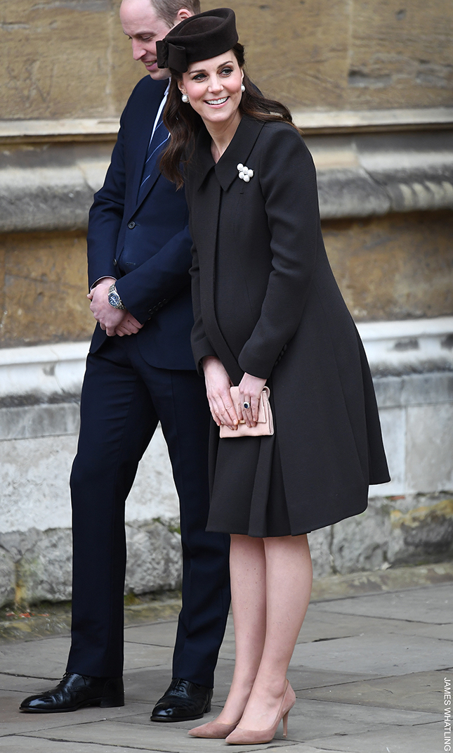 Kate Middleton wearing a chocolate brown Catherine Walker coat and Lock & Co. pillbox hat while pregnant at Easter service in 2018.