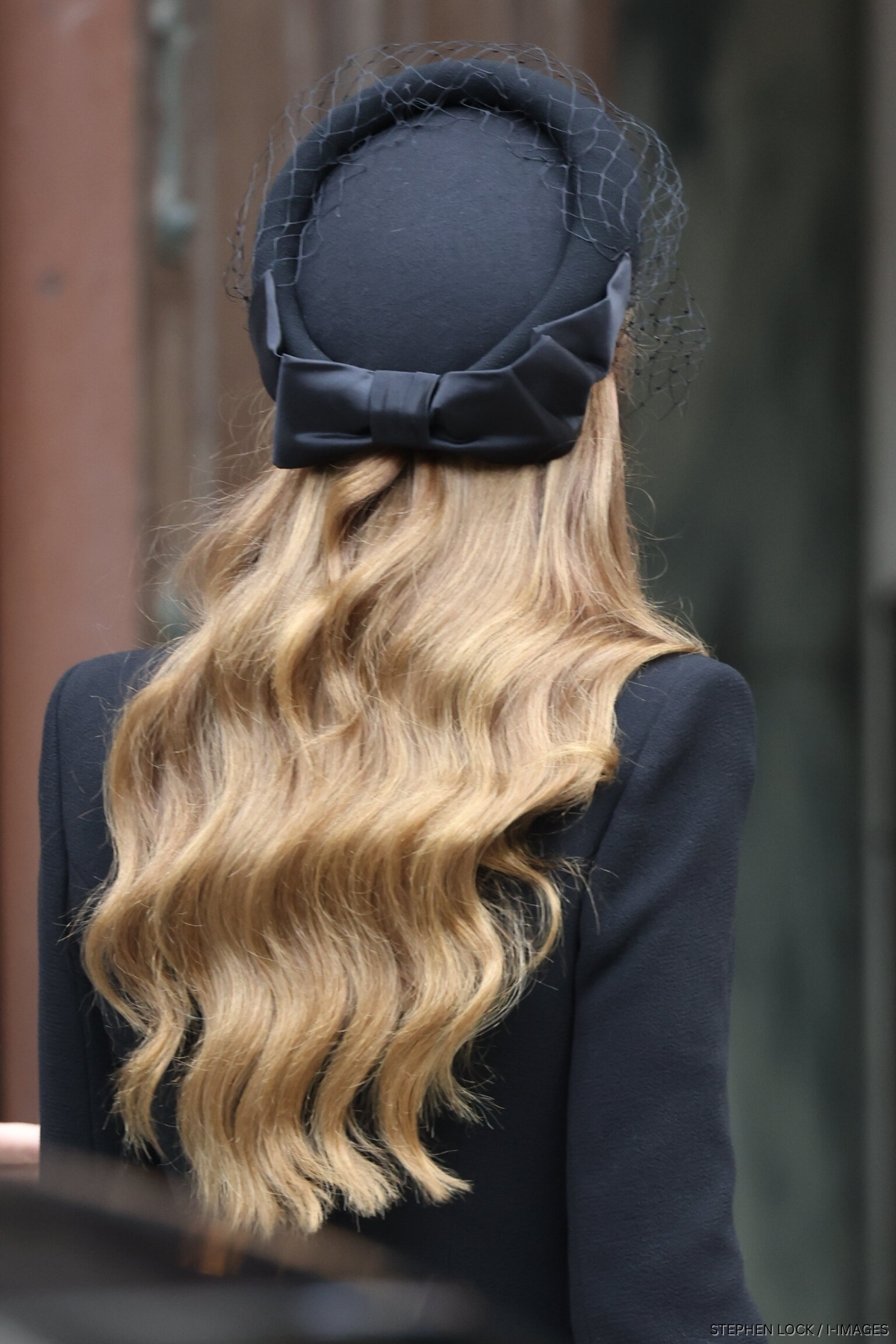 Kate Middleton's stunning golden brown hair and black bow hat 