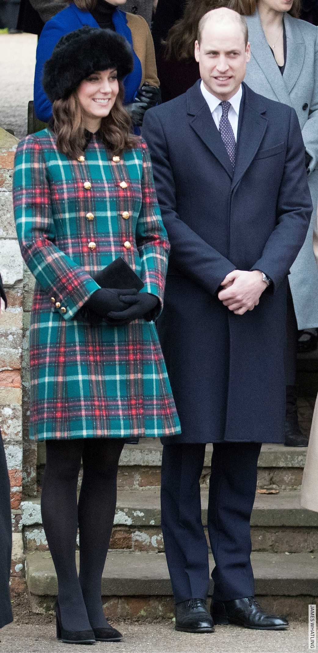 The Prince and Princess of Wales stood together on Christmas Day, the Princess wears a green and red tartan coat.