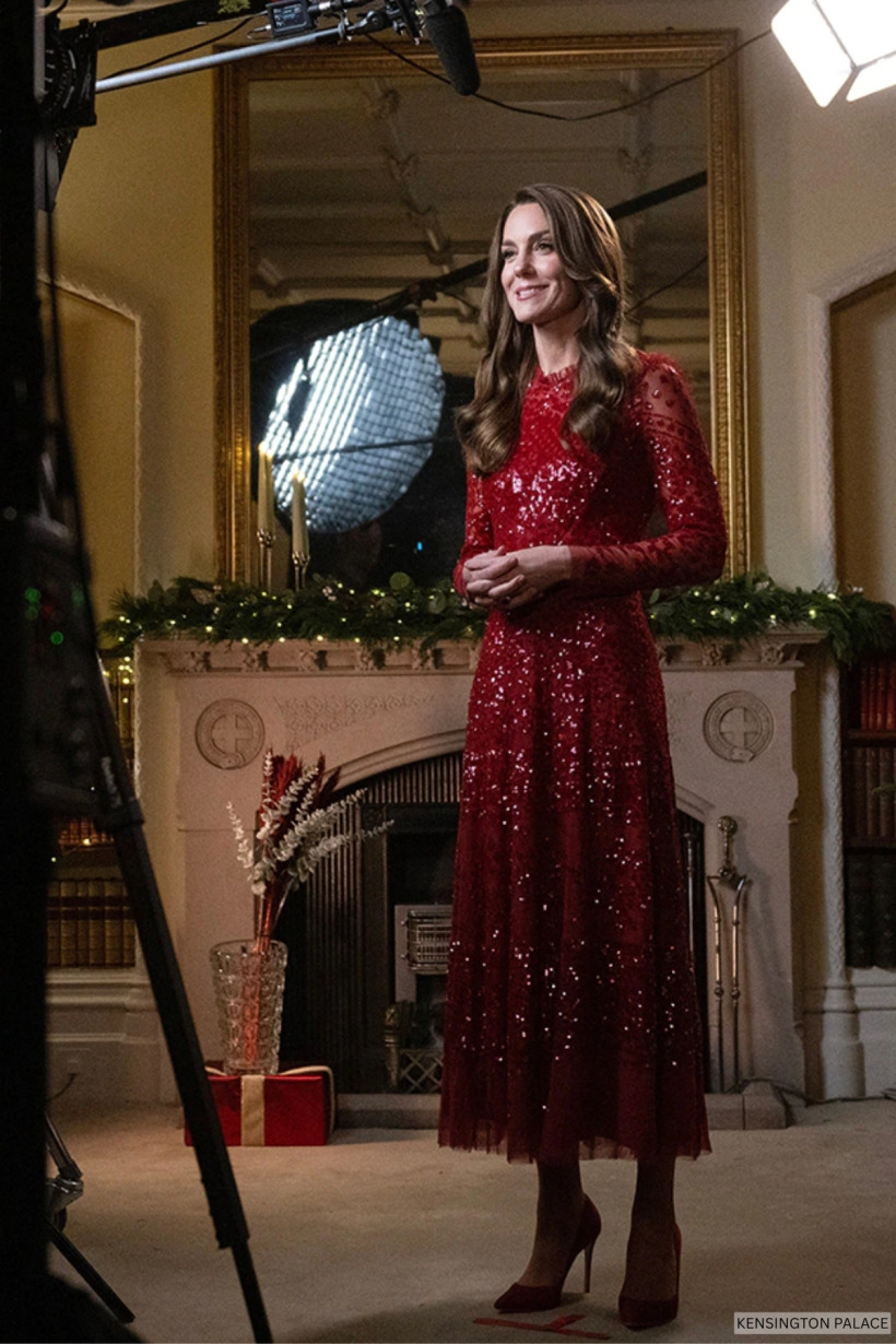 Kate Middleton wearing a red sequin dress while filming a promotional video for her Christmas carol service