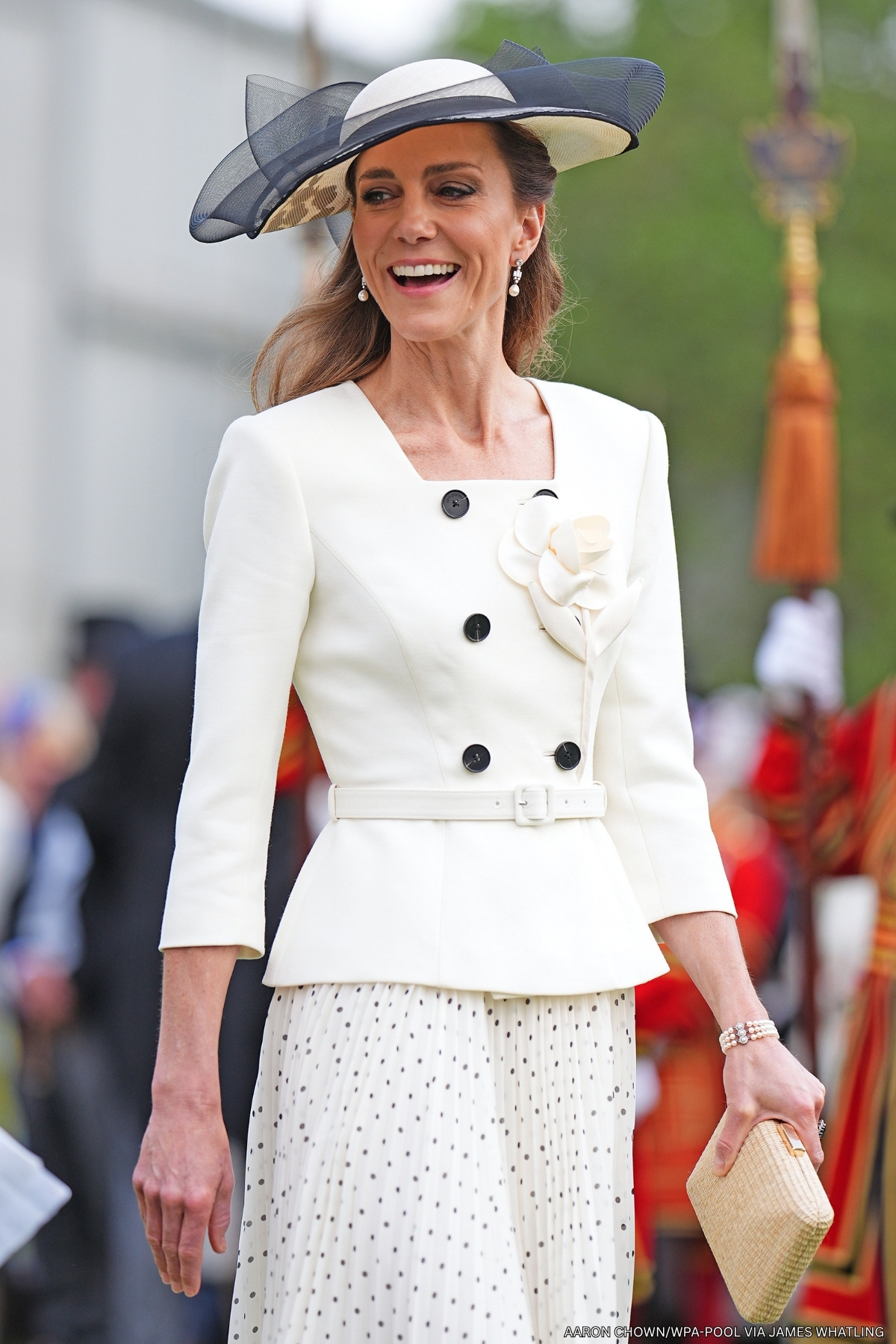 The Princess of Wales pairs heirloom jewels with vintage hat and 3D flower polka dot dress for palace Garden Party