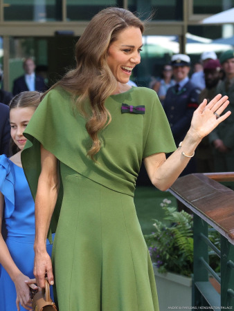 Kate Middleton at Wimbledon today, wearing a green dress.