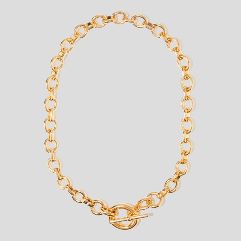 The Laura Lombardi 'Portrait' necklace's chunky gold chain with interlocking round and oval links