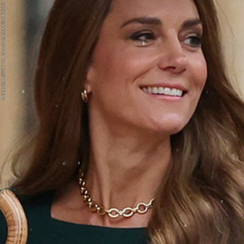 Close-up of Kate Middleton's Cartier Trinity earrings and Laura Lombardi necklace