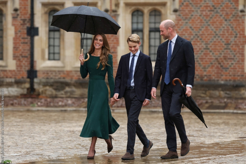 Prince William, Kate and George arrive at Eton in the rain